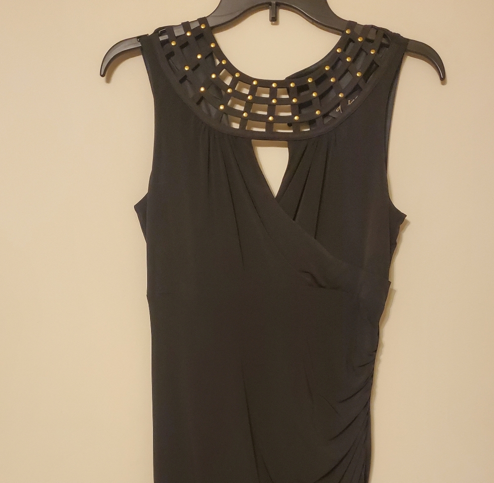 Black,  sleeveless dress with gold detailing
